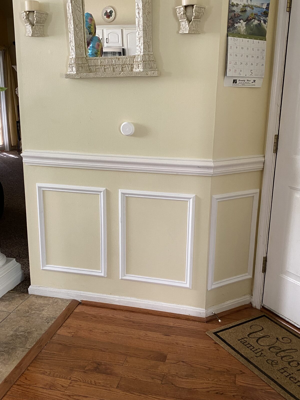 Walk-in shower with wood-look tile, LED accent lighting, and built-in niche