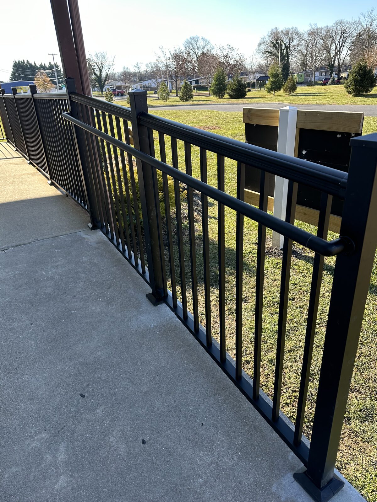 Black aluminum porch railing with double top rail
