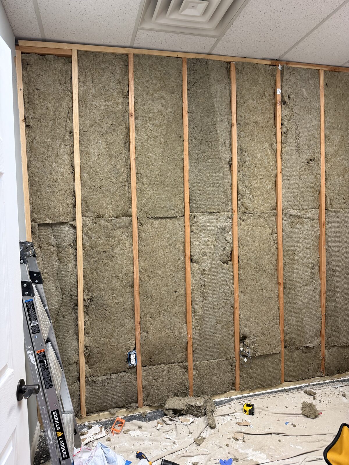 Rockwool stone wool insulation between basement framing studs